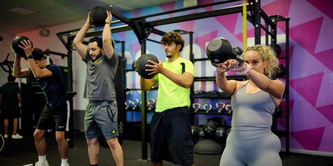 People working out in a strength and conditioning class