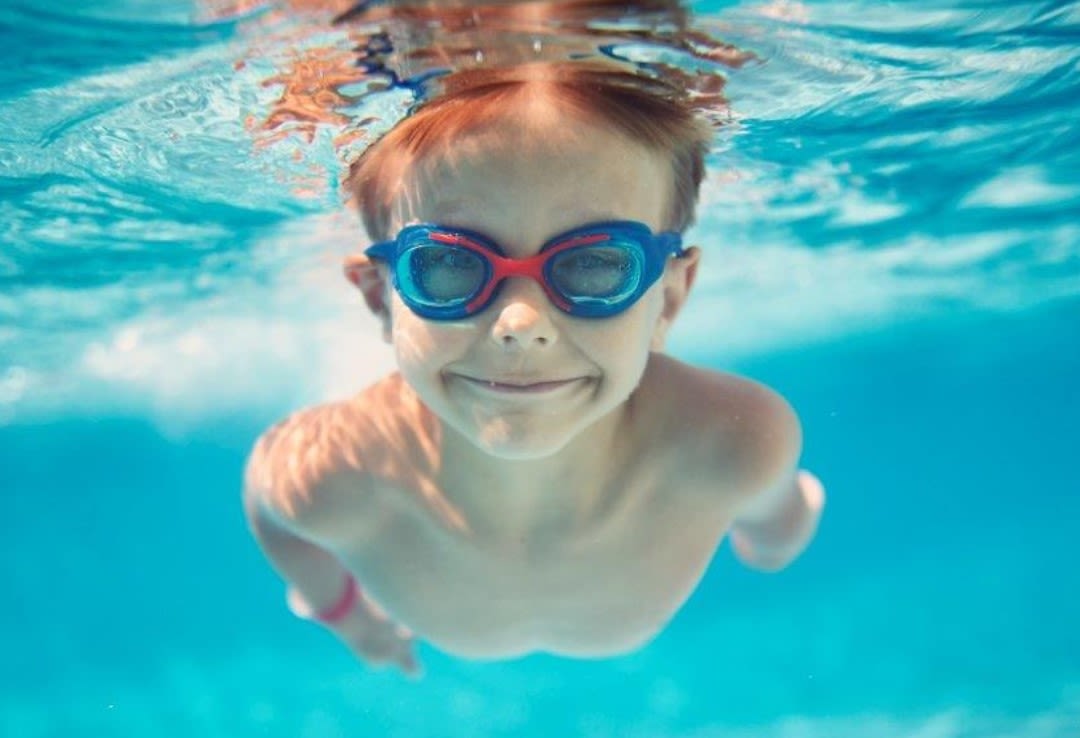 Boy swimming underwater