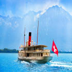 Cruise Ship on Lake Geneva with Mountain Backdrop