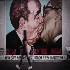Graffiti of Men Kissing on the Berlin wall