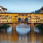 Yellow Ponte Vecchio Bridge in Florence Italy