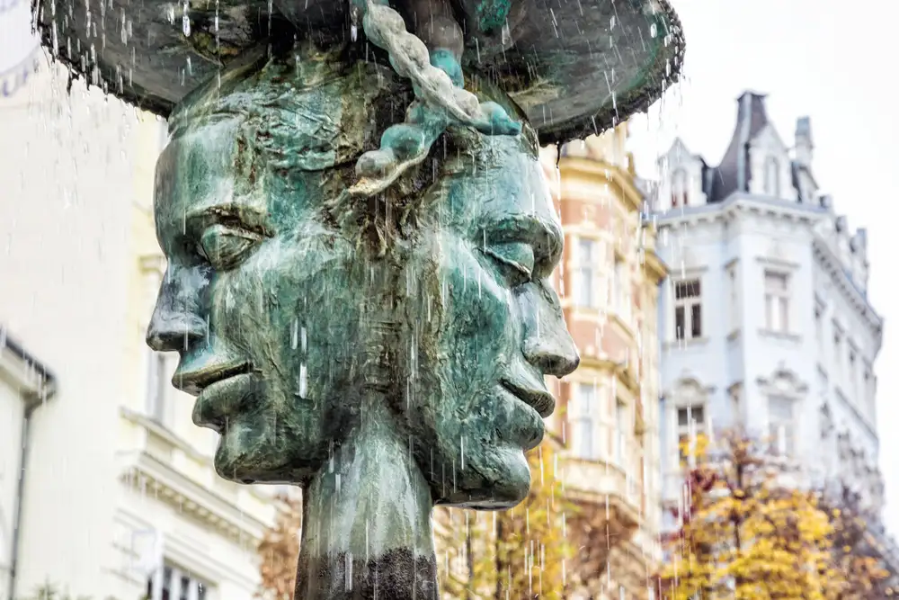 Closeup of Two Faced Sculpture in Karlovy Vary