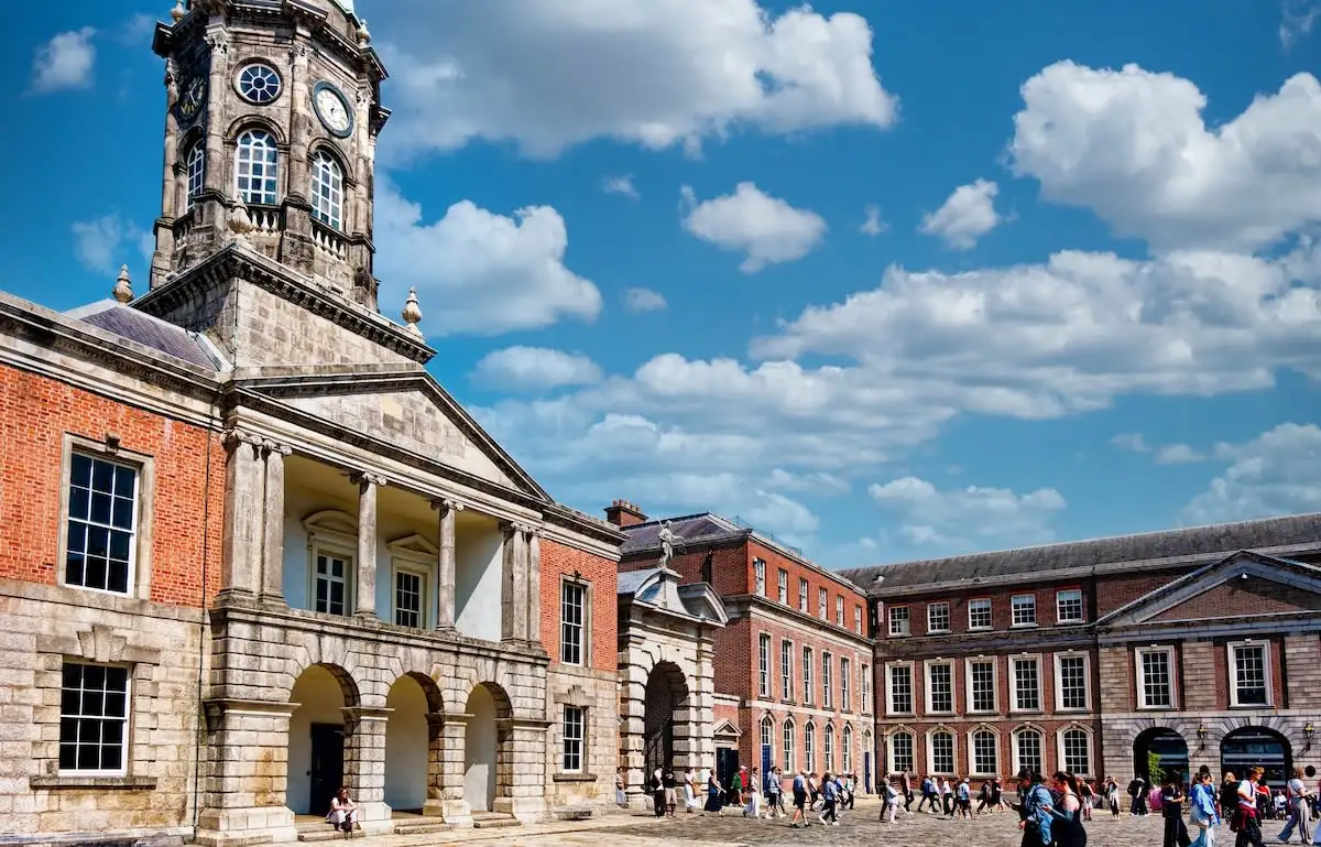 visitors walking near buildings at Dublin Castle