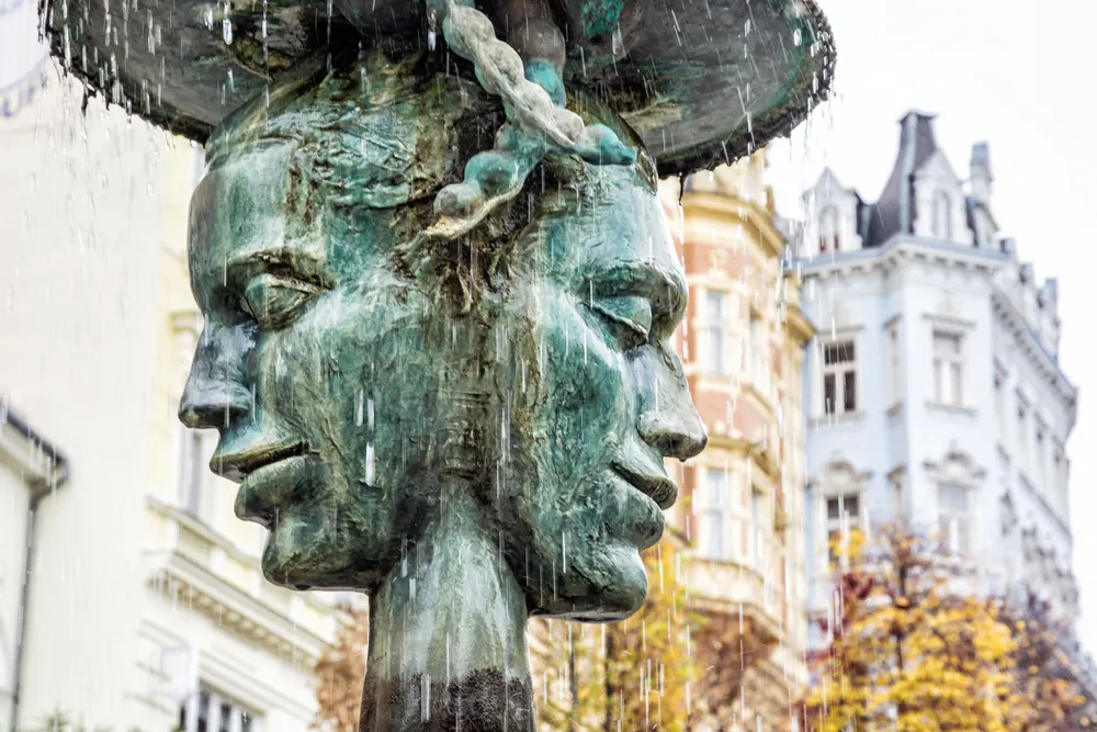 Closeup of Two Faced Sculpture in Karlovy Vary