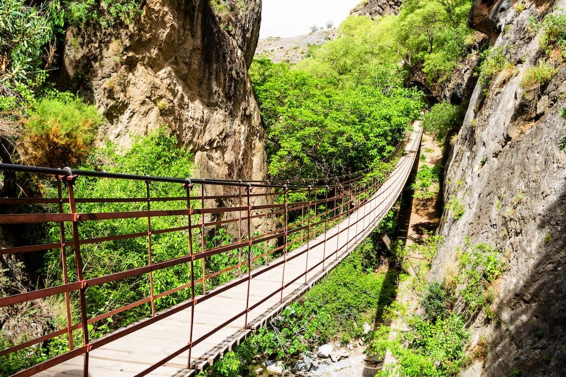 Suspension footbridge in Los Cahorros in Sierra National Park
