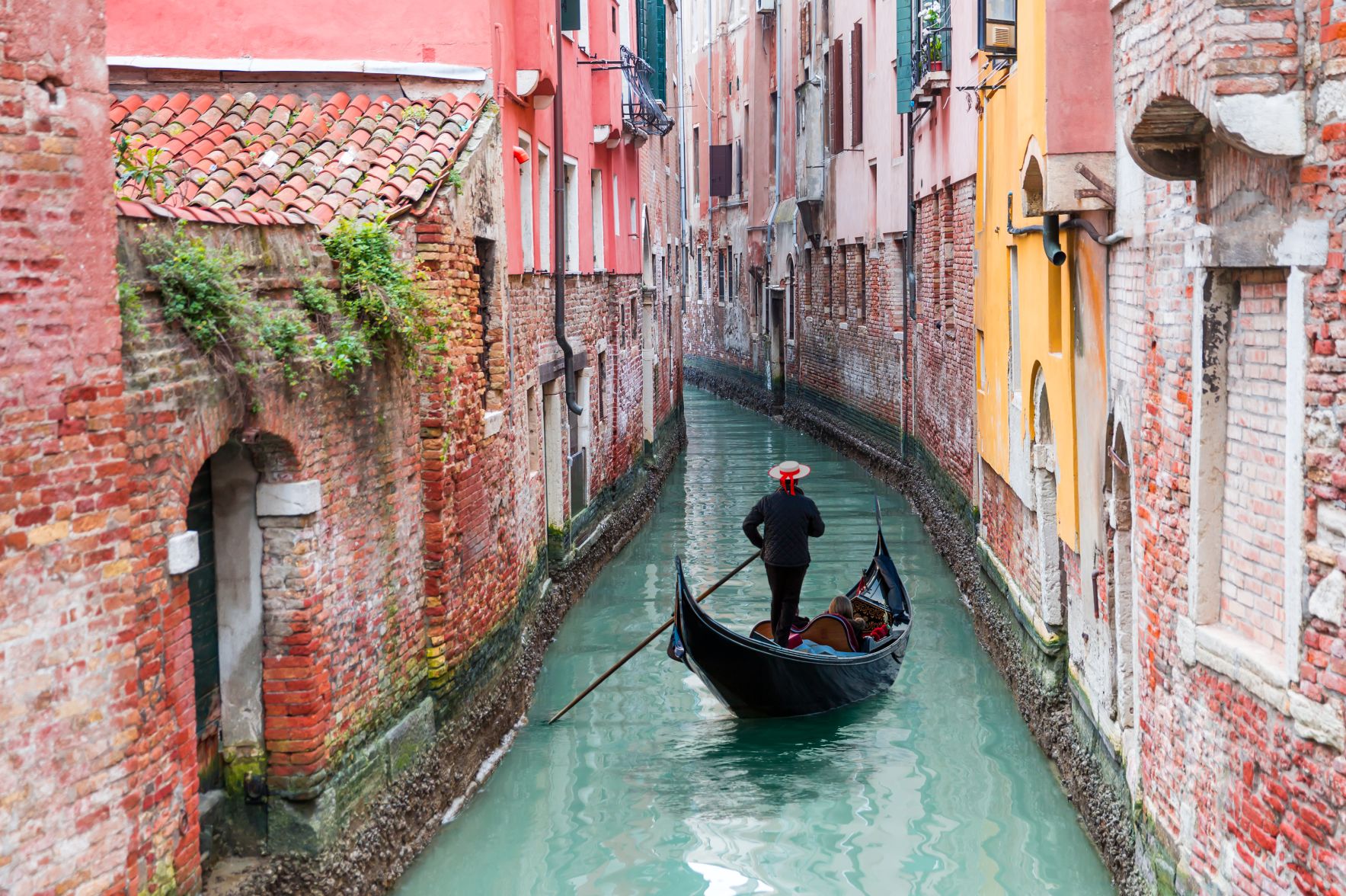 gondola ride on a canal in venice italy 