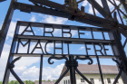 Sign Inscripted With Arbeit Macht Fret at the Entry to Dachau Concentration Camp 