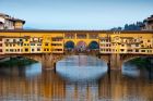 Yellow Ponte Vecchio Bridge in Florence Italy