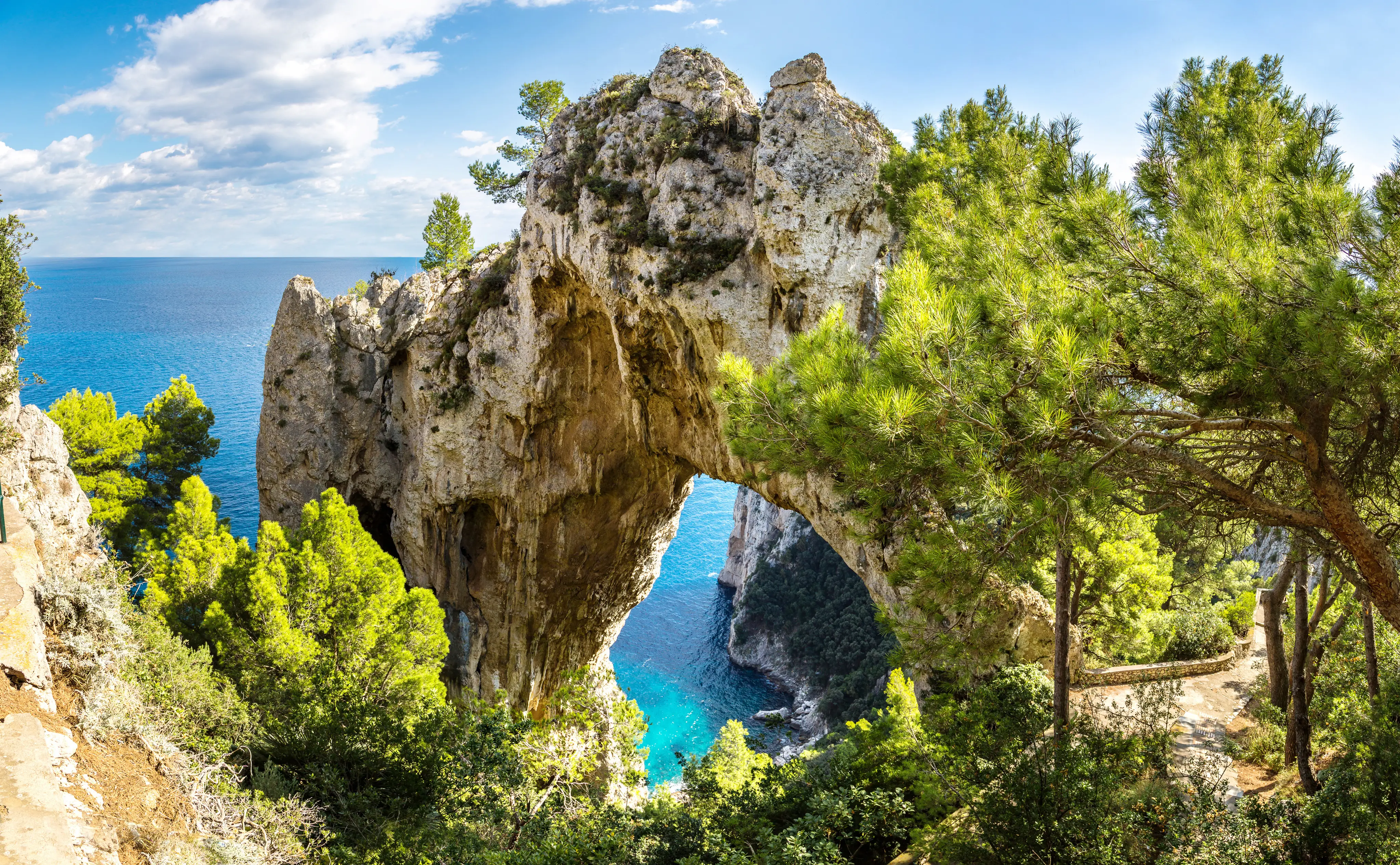 Rocky Arch and Cliffs Overlooking Sea on the Island of Capri