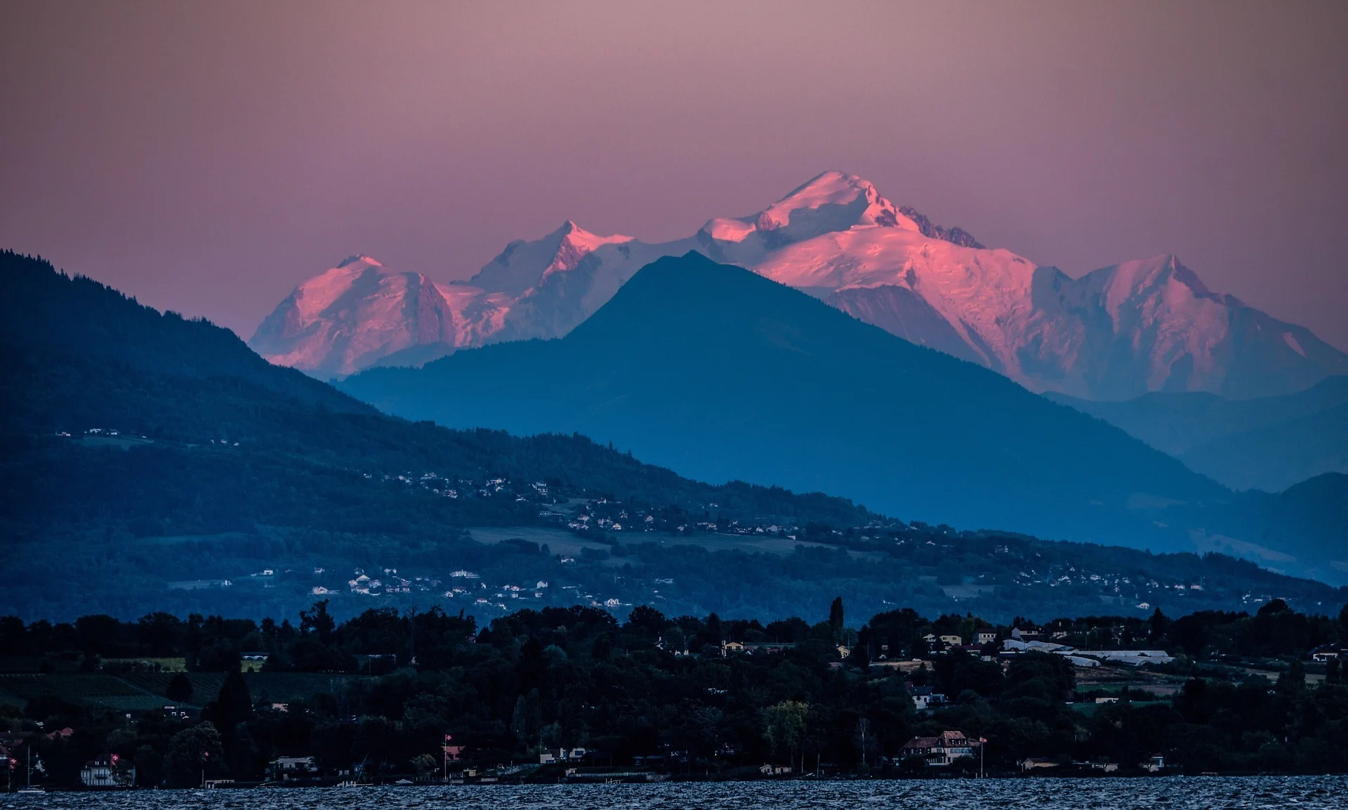 sunset over mountain alps in geneva switzerland 