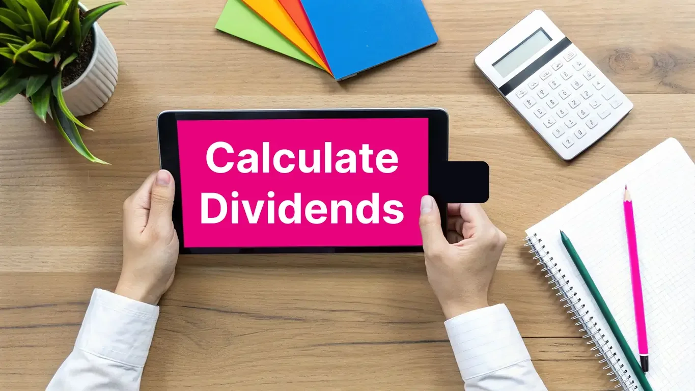 A person using a calculator to analyze financial data on a screen