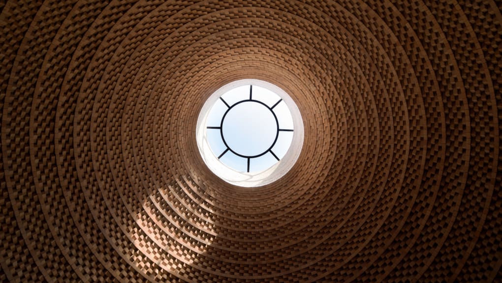Interior view looking up through a circular window at the Millet Vinegar Museum