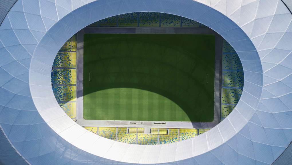 Aerial view into Chengdu Phoenix Mountain Football Stadium daytime