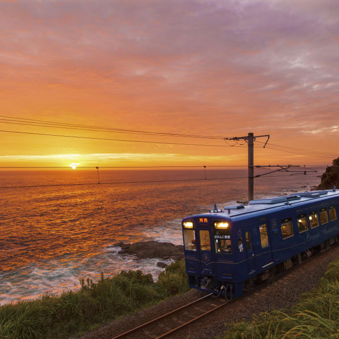 Passengers catch a brief glimpse of Doll Rock, as the train passes between tunnels. (left) Passengers can enjoy spectacular views from the train as it hugs the coastline between Satsuma-Taki Station and Nishikata Station. (right)