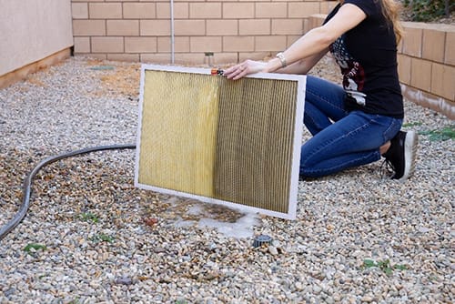 Use a low-pressure water source to clean your filter