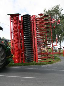 Kverneland F35 compact travelling on road with tractor