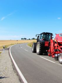 Kverneland U-drill, transported on road by tractor