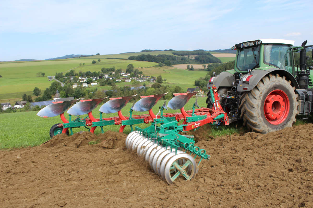 Packers - Kverneland Packomat on the field, pushing down stones, crush clods and packing the soil during operation