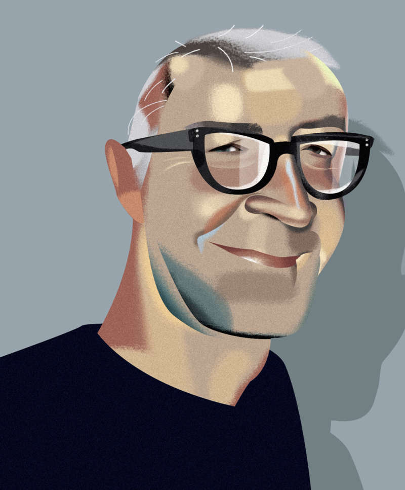An illustrated portrait of illustrator Nigel Buchanan wearing a black t-shirt and glasses with grey hair and smiling at the camera. 