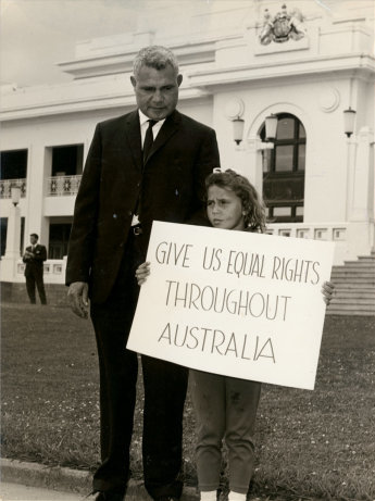 Former boxer Jack Hassen and his daughter demonstrating outside Parliament House, Canberra, in the lead up to the 1967 Referendum. Photo: AIATSIS Collection DIXON.C01.DF-D00000172