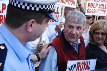 Peter Cundall is arrested outside Parliament House during anti-pulp mill protests in Hobart, Tasmania, 19 November 2009. Paul Carter, AAP.
