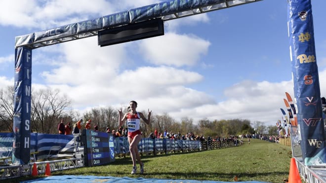 NC State Wolfpack cross country runner Elly Henes crosses the finish line.