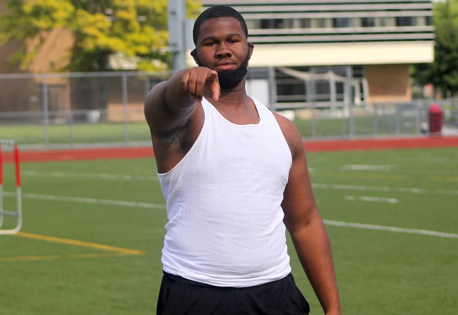 Rivals100 defensive tackle Rayshaun Benny holds a Michigan Wolverines football recruiting offer from Jim Harbaugh. 