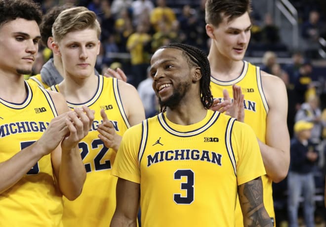 From left: Michigan Wolverines basketball's Adrien Nunez, Cole Bajema, Zavier Simpson and Colin Castleton.
