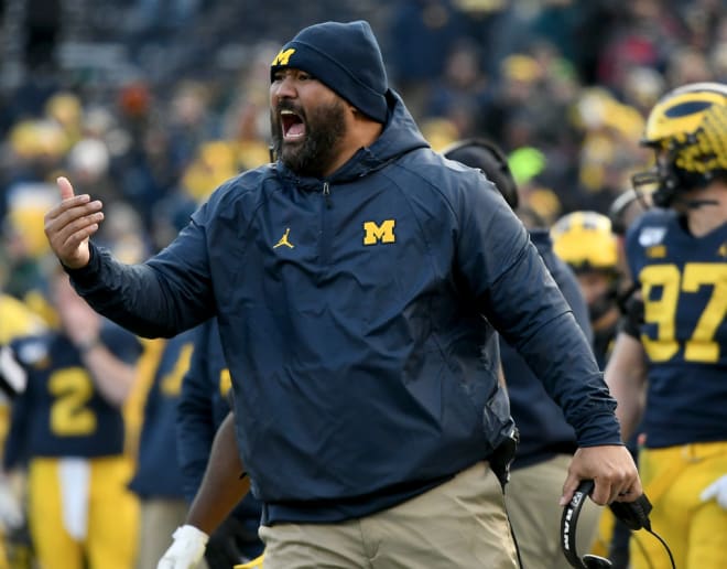 Michigan Wolverines football defensive line coach Shaun Nua is working hard on the recruiting trail