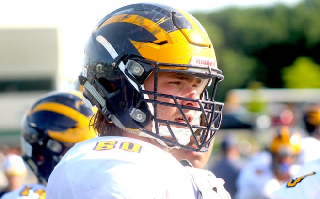 Rivals100 offensive lineman Rocco Spindler holds a Michigan Wolverines football recruiting offer from Jim Harbaugh.