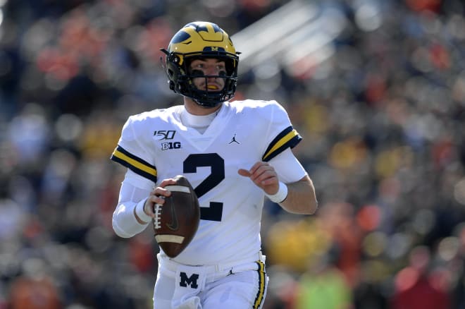 Michigan Wolverines football quarterback Shea Patterson looks to throw.
