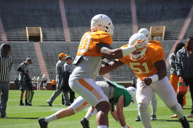 Kenny Bynum works a tackling drill Saturday inside Neyland Stadium. He'll work abroad next month in London as part of an international studies program.