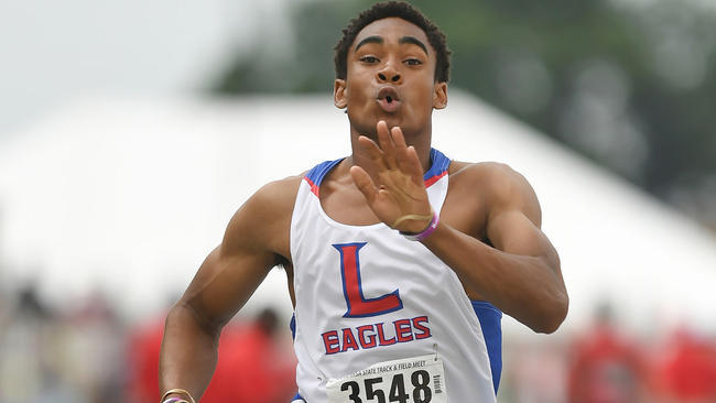 Ruiz won state titles in the long jump and triple jump with personal records on Saturday.