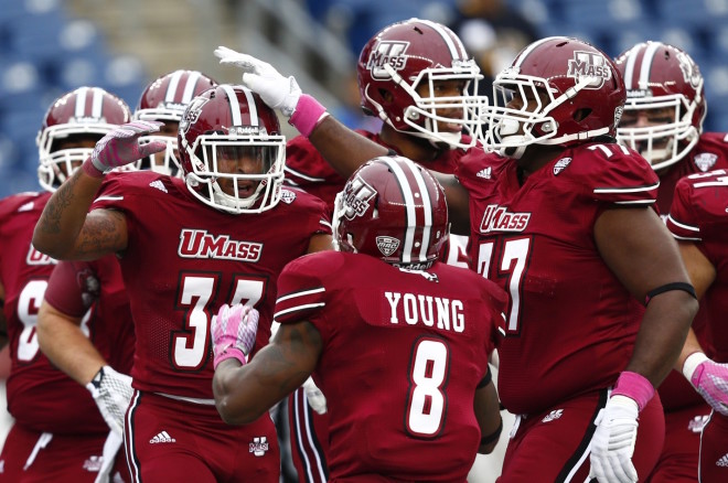 UMass players celebrate during a game last season
