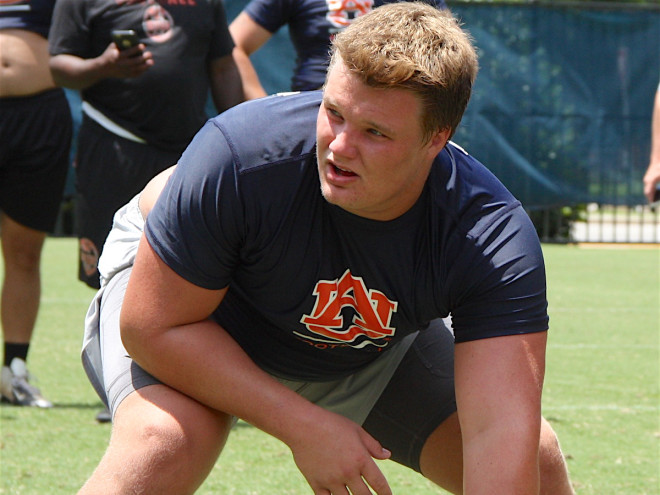 Brannon worked at center during Auburn's OL/DL camp Saturday morning.