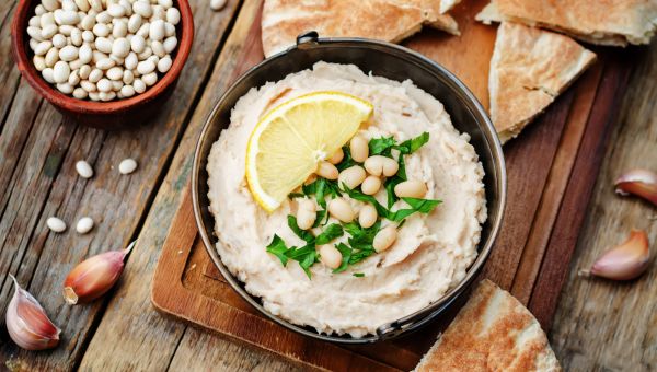 bowl of hummus and pita chips