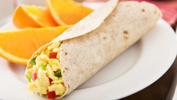 Breakfast burrito on plate