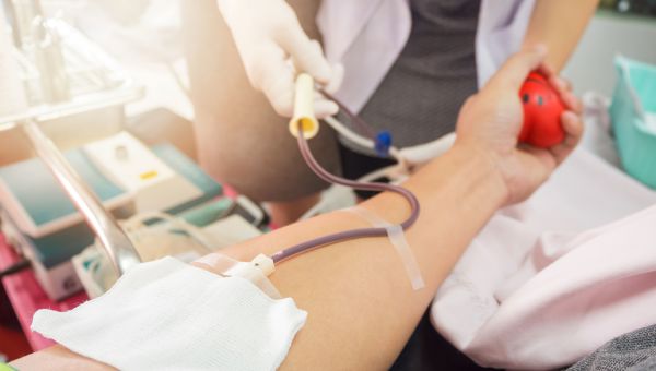 person donating blood, blood drive, donating at blood drives, giving blood