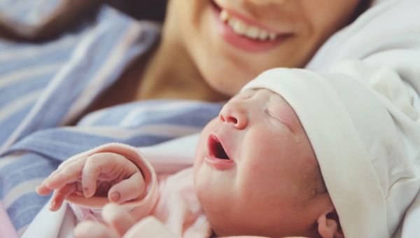 parent with newborn baby