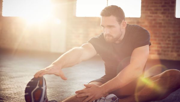 athletic man stretching