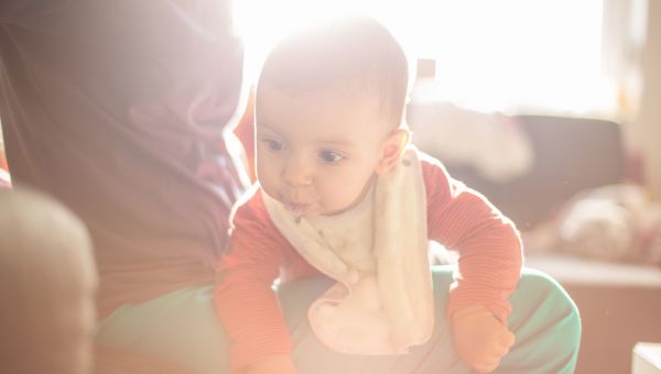 Mother holding infant