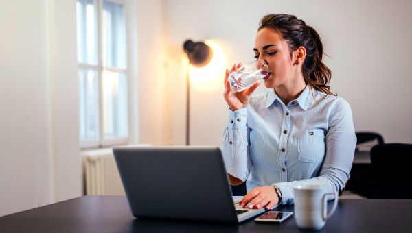 Woman drinking glass of water