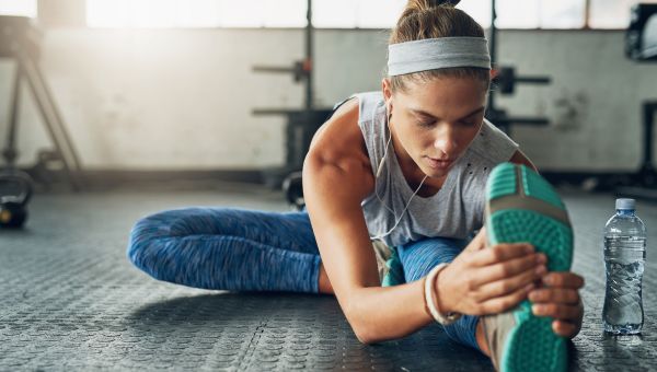 woman stretching legs