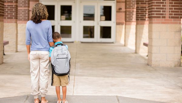 mother and child going to school