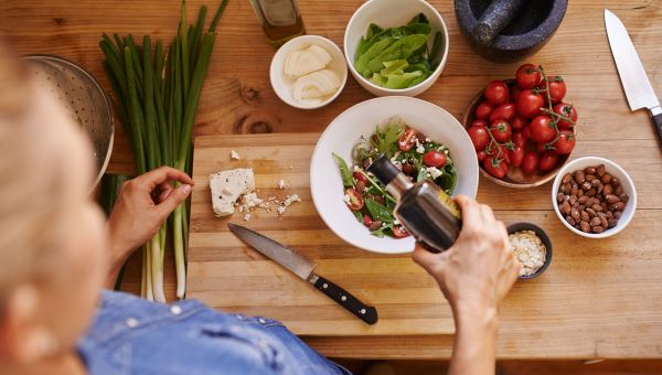 Woman making a healthy salad