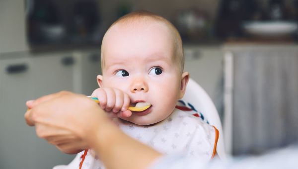 Mother feeding baby