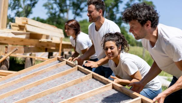 team building a house