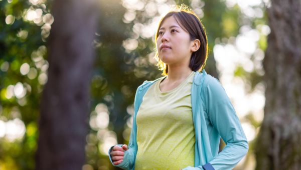 pregnant person jogging