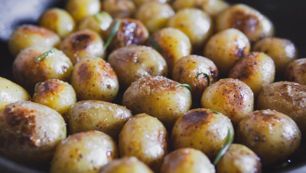 A pan of rosemary and healthy roasted potatoes.