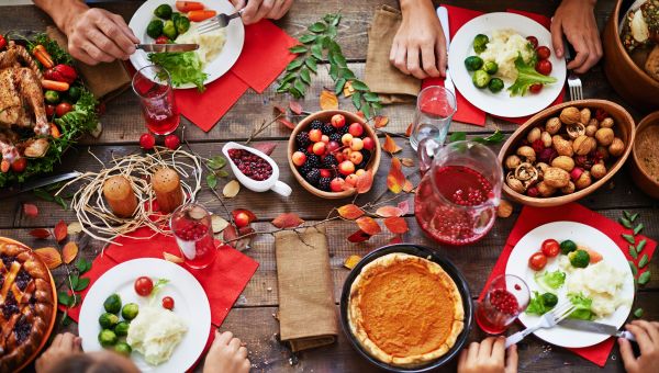 A healthy thanksgiving feast full of nuts, fruits, and vegetables.